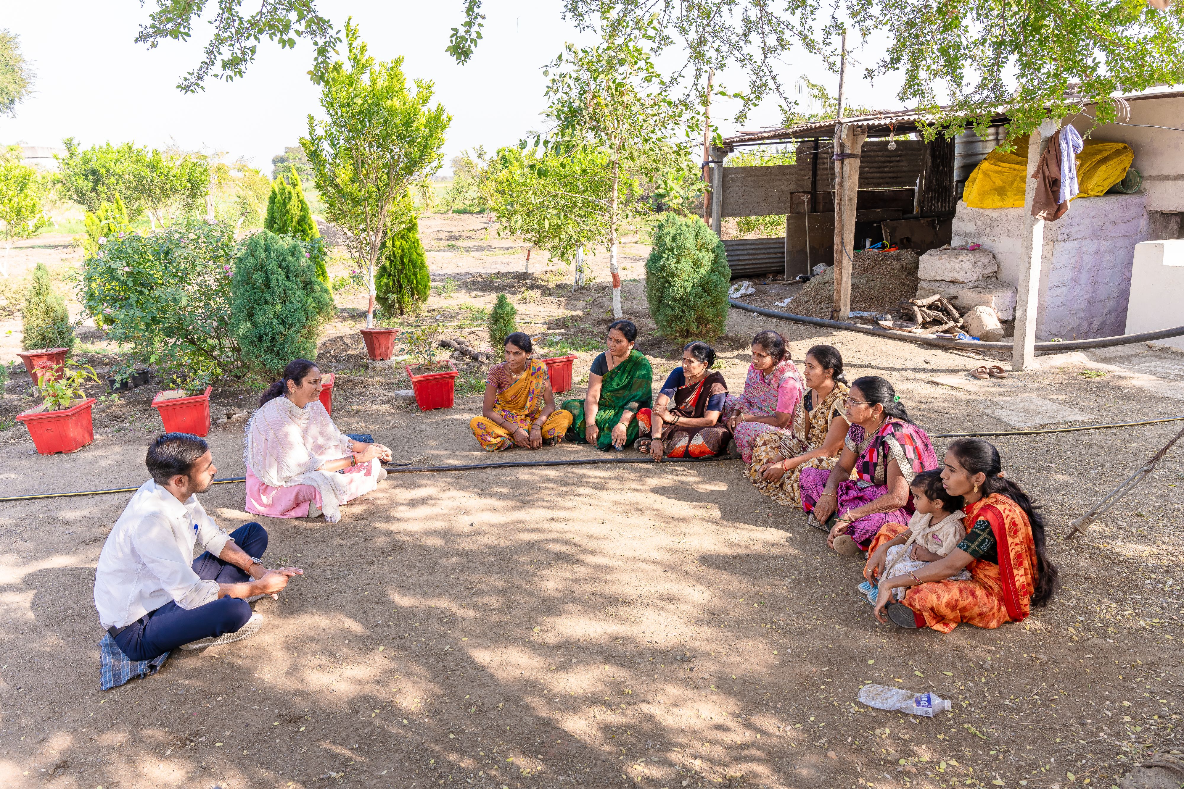 Women meeting in a circle outdoors