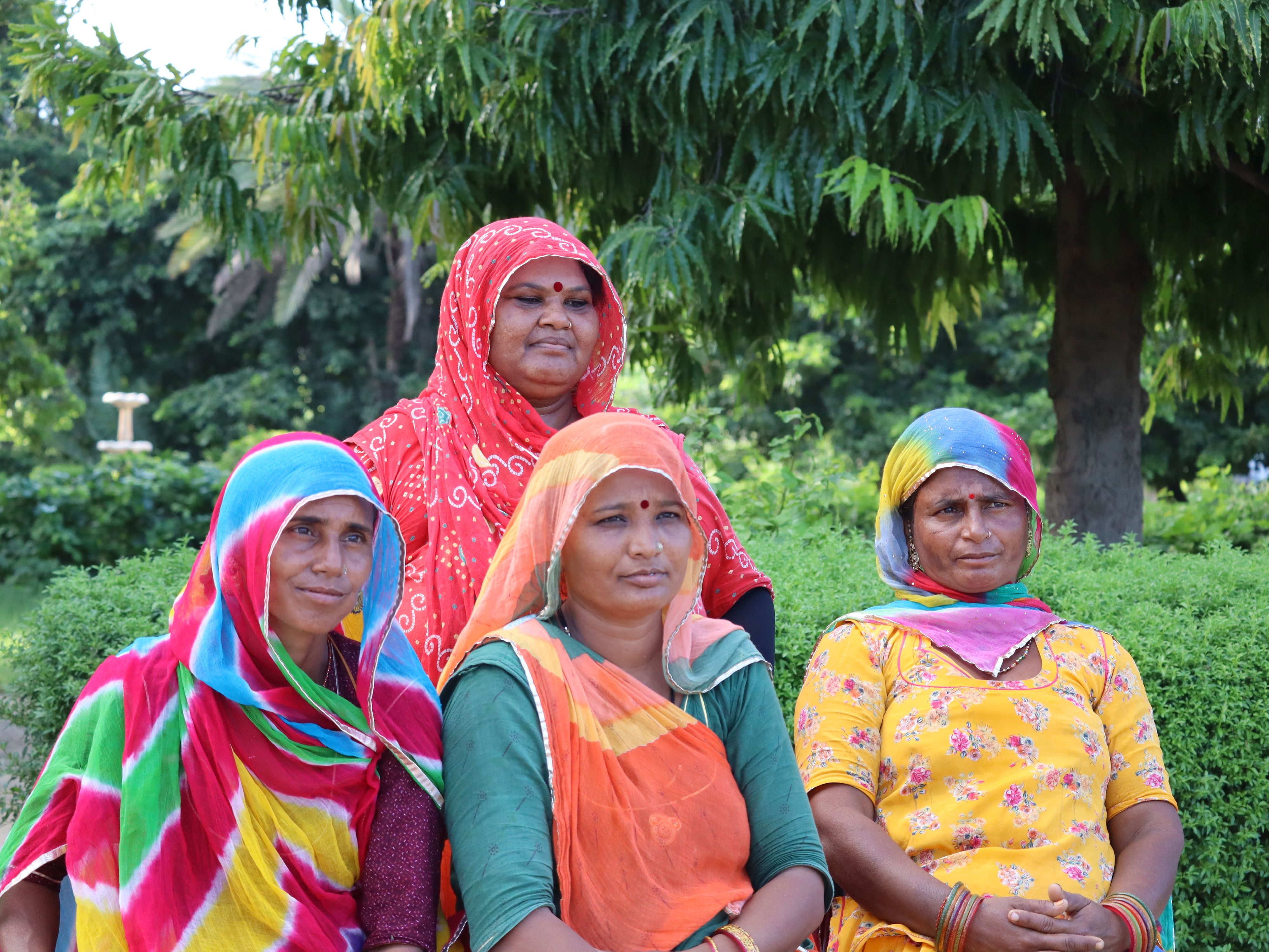 A group of women smiling together